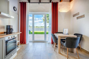 Studio-Wohnung Dobbe mit eingezäunten Garten am Badesee Tannenhausen